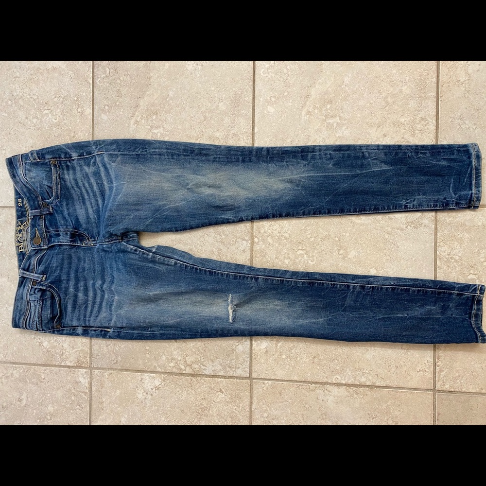 Skinny Buckle black jeans
